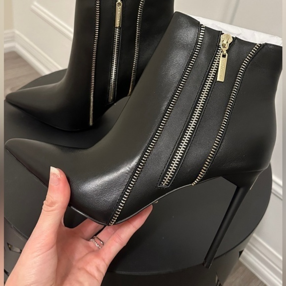 Brand new Marciano Sexy black booties for Spring
